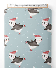Tissu - Pingouins patinant chapeaux rouges