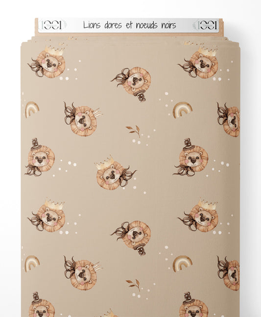 Tissu - Lions dorés et nœuds noirs