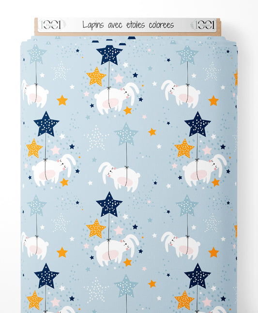 Tissu - Lapins avec étoiles colorées