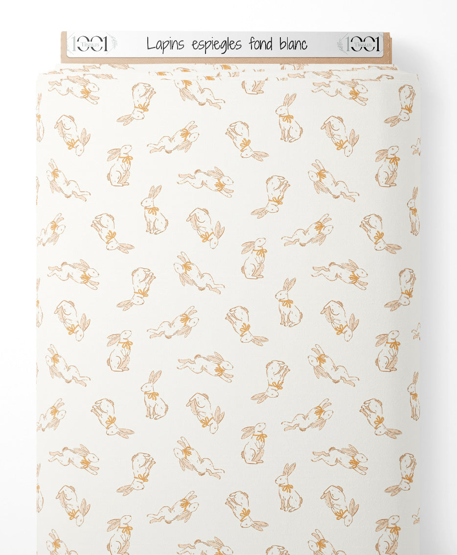 Tissu - Lapins espiègles sur fond blanc
