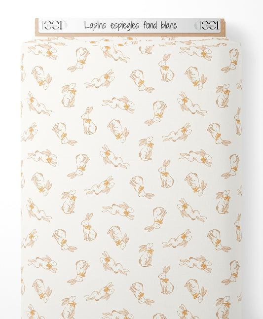 Tissu - Lapins espiègles sur fond blanc