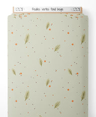 Tissu - Feuilles vertes sur fond beige