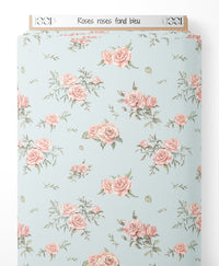 Tissu - Roses roses sur fond bleu