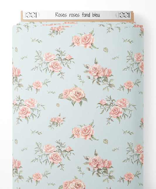 Tissu - Roses roses sur fond bleu