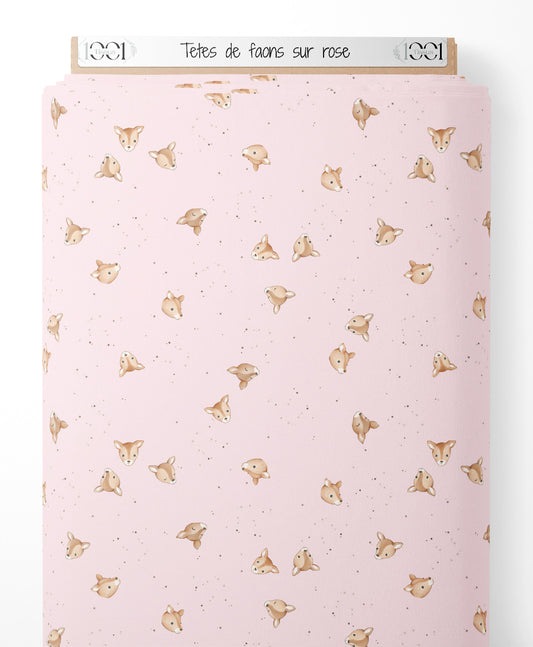 Tissu - Têtes de faons sur rose