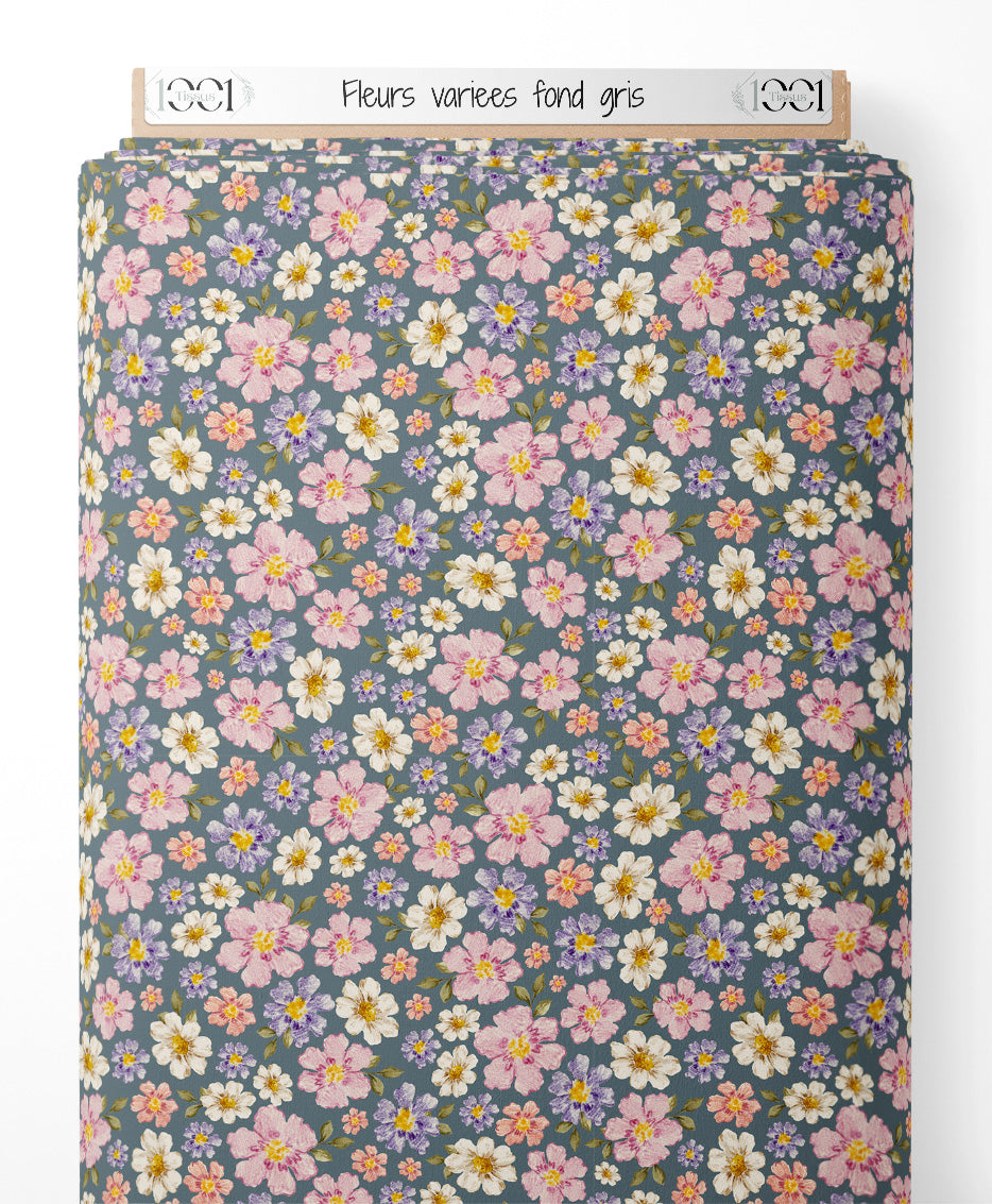 Tissu - Fleurs variées sur fond gris