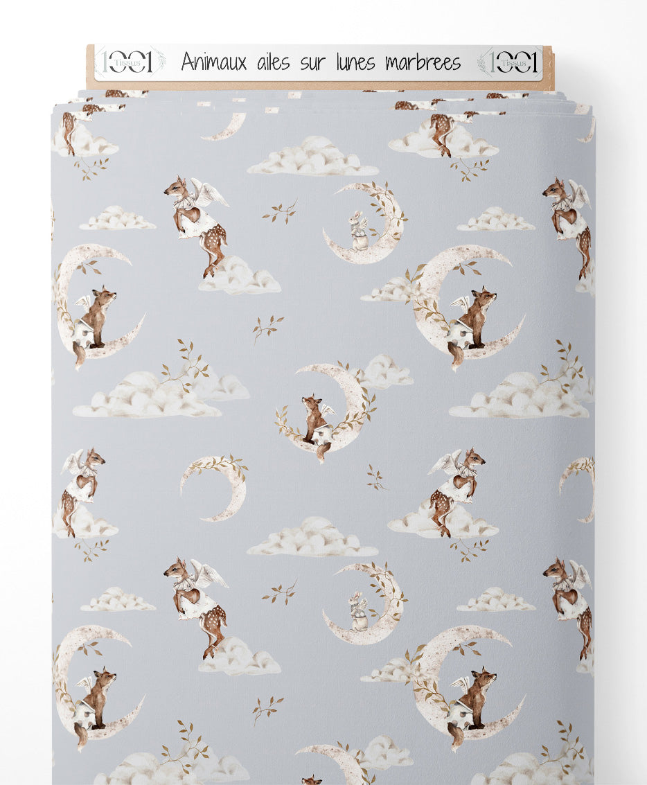 Tissu - Animaux ailés sur lunes marbrées