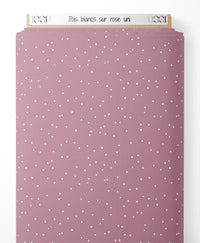 Tissu - Pois blancs sur rose uni
