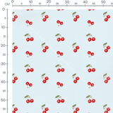 Tissu - Cerises rouges sur fond bleu