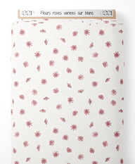 Tissu - Fleurs roses variées sur blanc