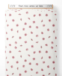 Tissu - Fleurs roses variées sur blanc