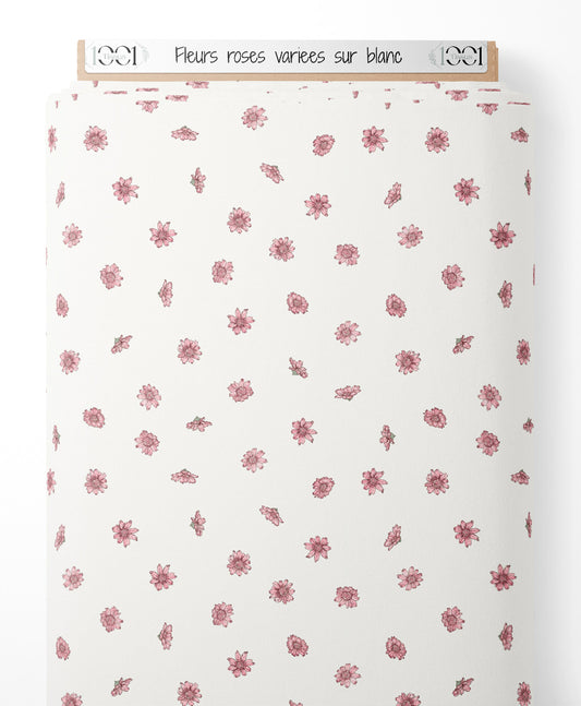 Tissu - Fleurs roses variées sur blanc