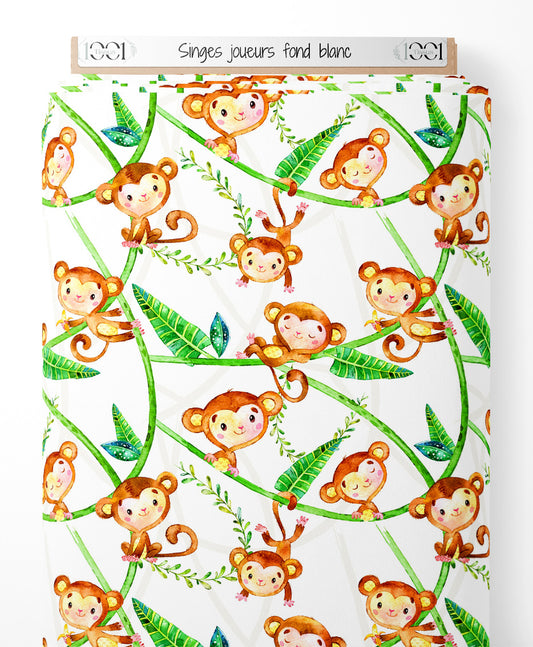 Tissu - Singes joueurs sur fond blanc