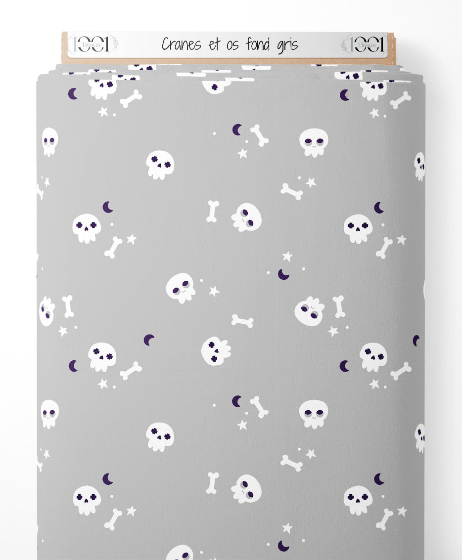 Tissu - Crânes et os sur fond gris