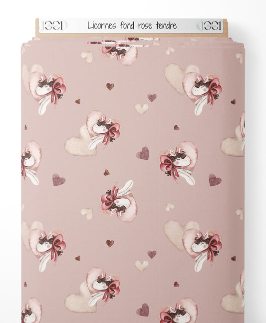 Tissu - Licornes sur fond rose tendre