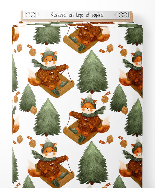 Tissu - Renards en luge et sapins