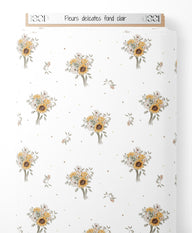 Tissu - Fleurs délicates sur fond clair