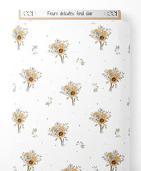 Tissu - Fleurs délicates sur fond clair