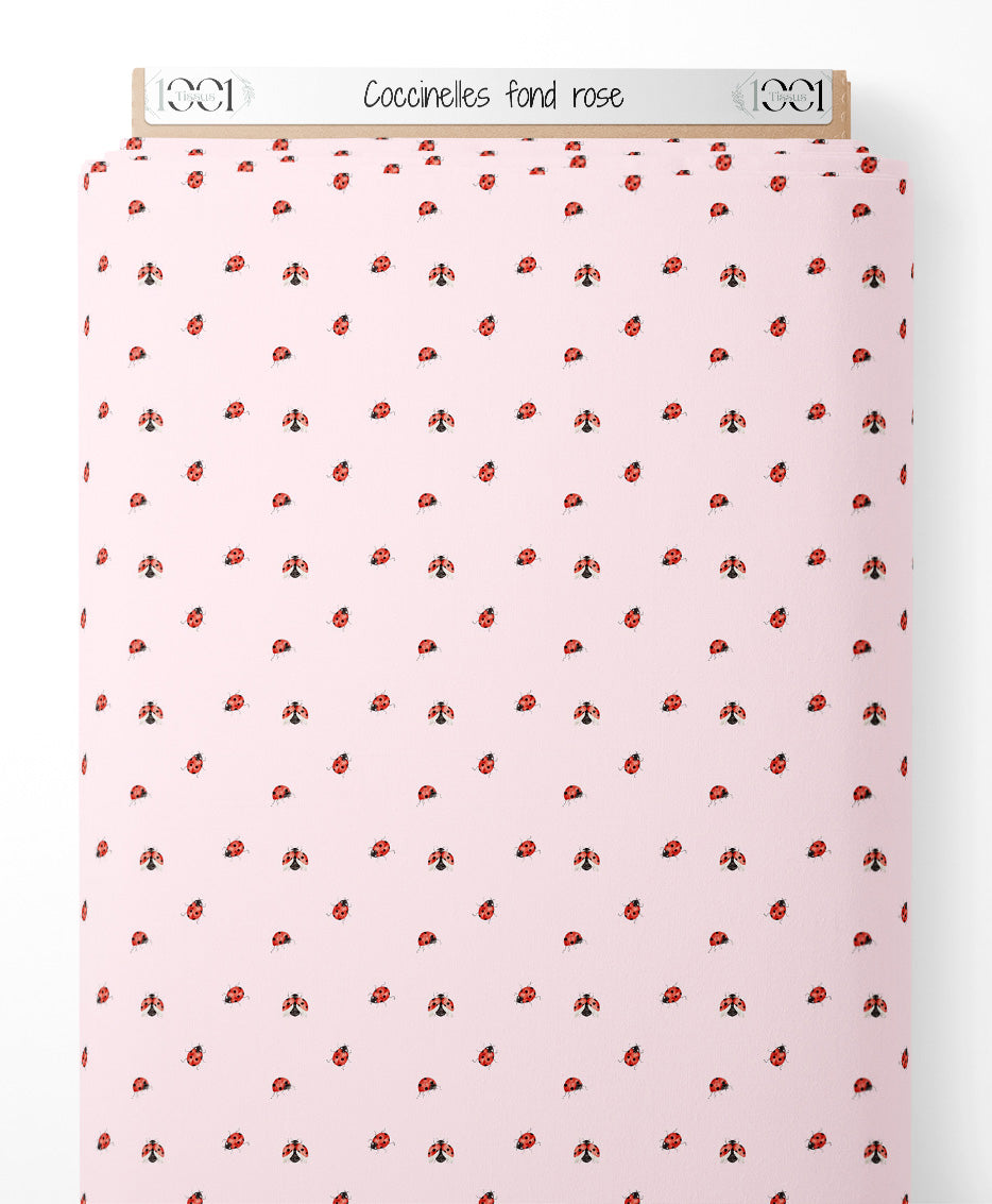 Tissu - Coccinelles sur fond rose