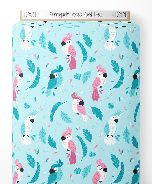 Tissu - Perroquets roses sur fond bleu