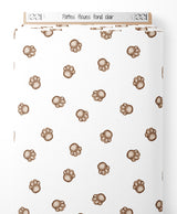 Tissu - Pattes floues sur fond clair