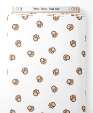 Tissu - Pattes floues sur fond clair