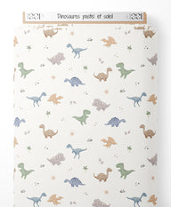 Tissu - Dinosaures pastel et soleil