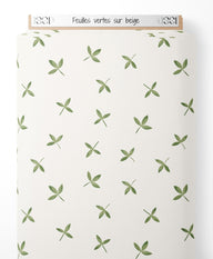 Tissu - Feuilles vertes sur beige