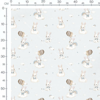 Tissu - Chiens en poses sur bleu doux