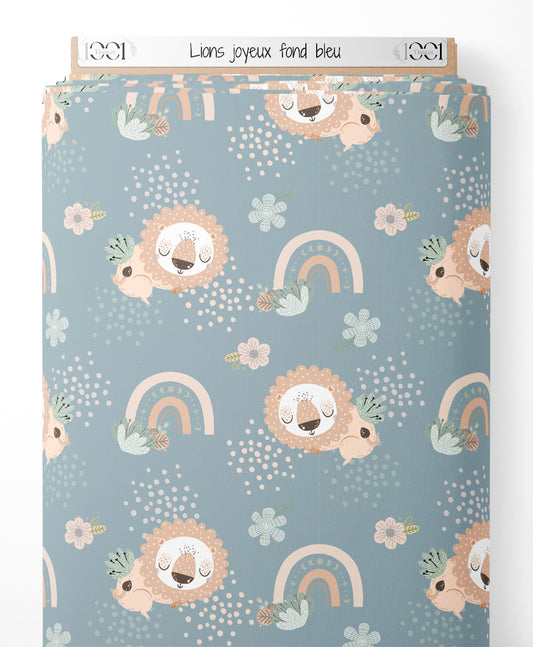 Tissu - Lions joyeux sur fond bleu