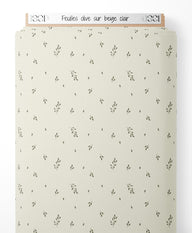Tissu - Feuilles olive sur beige clair