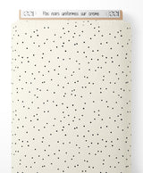 Tissu - Pois noirs uniformes sur crème