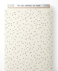 Tissu - Pois noirs uniformes sur crème
