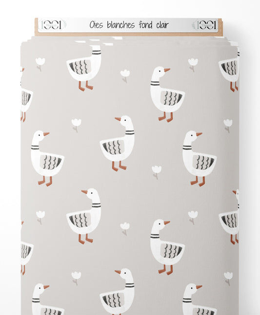 Tissu - Oies blanches sur fond clair
