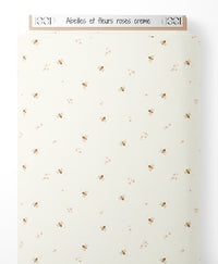 Tissu - Abeilles et fleurs roses crème