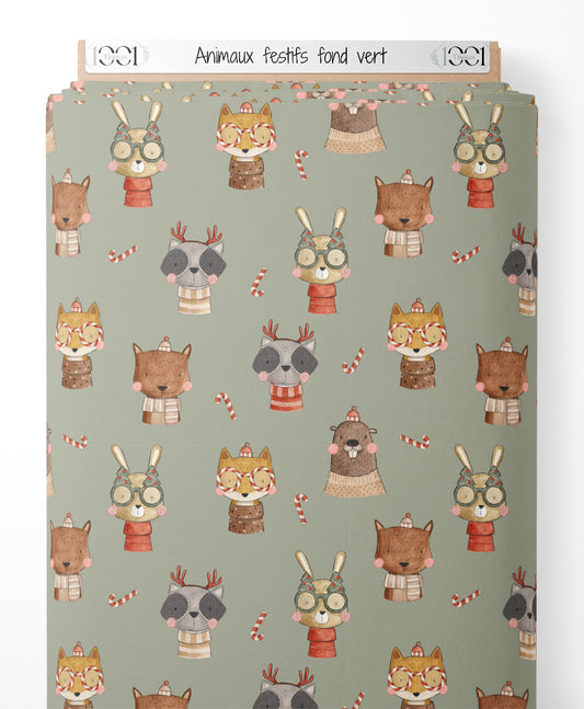 Tissu - Animaux festifs sur fond vert