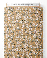 Tissu - Fleurs blanches et feuillage varié
