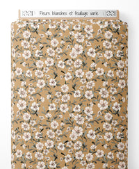 Tissu - Fleurs blanches et feuillage varié