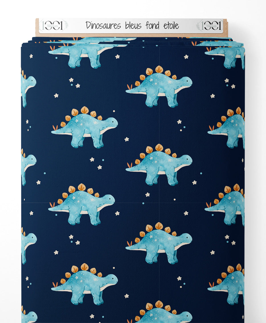 Tissu - Dinosaures bleus sur fond étoilé
