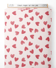 Tissu - Cœurs rouges sur rose pâle