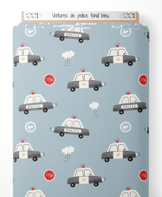 Tissu - Voitures de police sur fond bleu