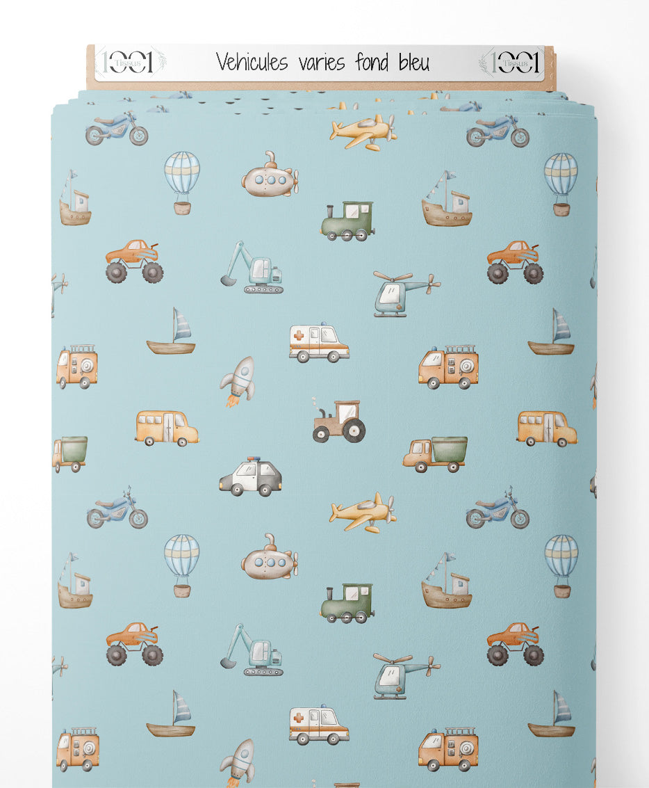 Tissu - Véhicules variés sur fond bleu