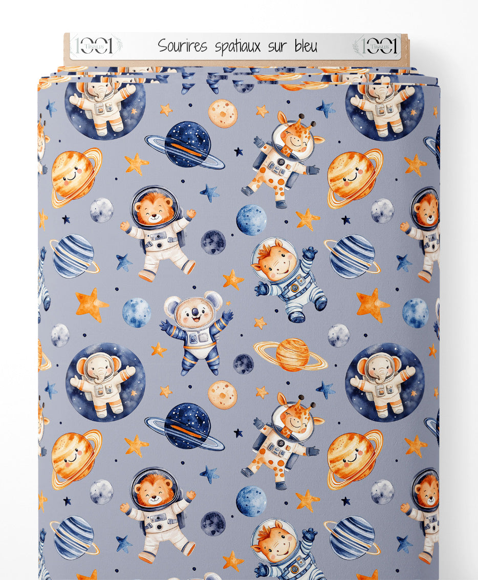 Tissu - Sourires spatiaux sur bleu