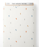 Tissu - Éclairs multicolores sur fond blanc