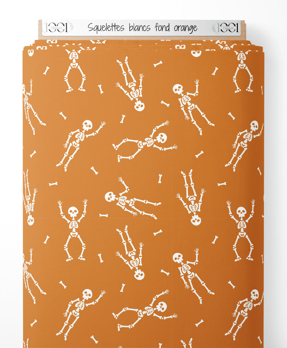 Tissu - Squelettes blancs sur fond orange