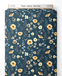Tissu - Fleurs variées sur fond bleu