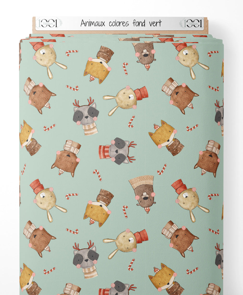 Tissu - Animaux colorés sur fond vert