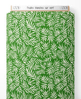 Tissu - Feuilles blanches sur vert