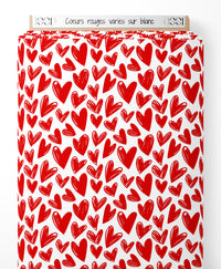 Tissu - Cœurs rouges variés sur blanc