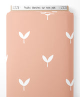Tissu - Feuilles blanches sur rose pâle